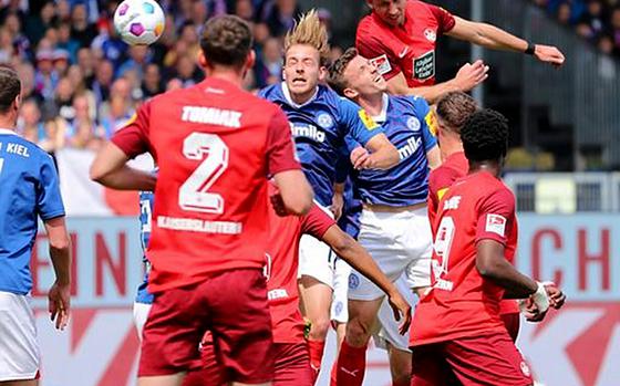 1. FC Kaiserslautern defeated Kiel 3-1 in Kiel Saturday to move out of the relegation zone, at least for a day.