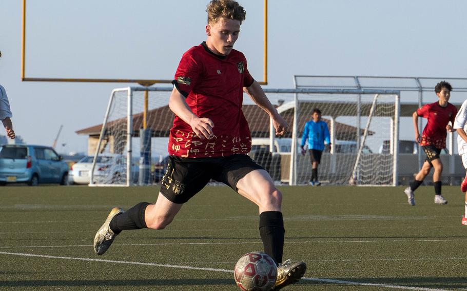 Nate Coffey moves the ball up field.