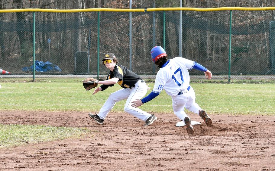 Stuttgart's Blake Rossignol steps off second base to receive a throw as Ramstein's Jaxon Lundell slides during the first game of a doubleheader Saturday on the baseball field near Southside Fitness Center on Ramstein Air Base, Germany.
