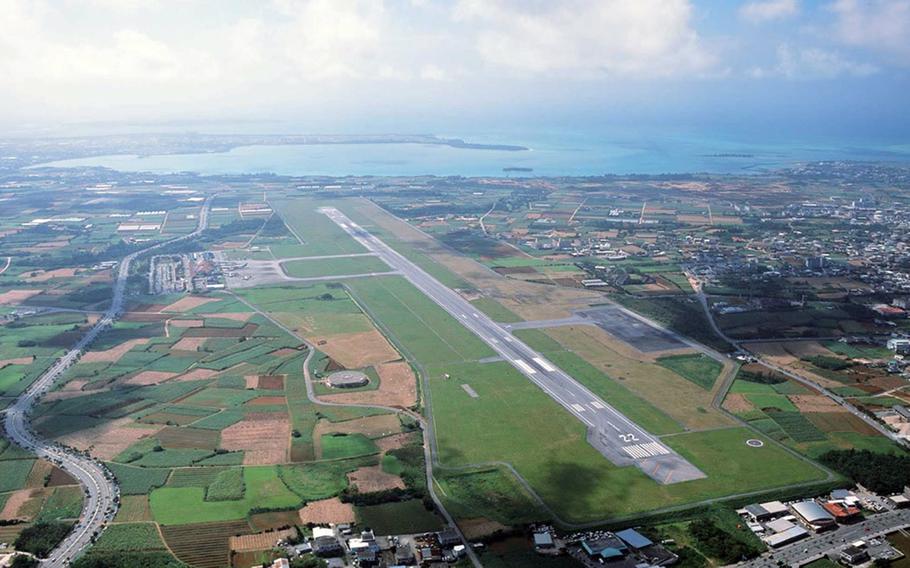 Aerial view of Miyako Airport and surrounding Miyakojima city.