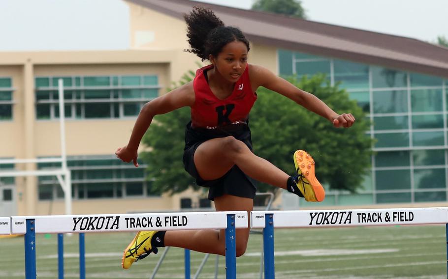 Nina Gaudin jumps over a hurdle.