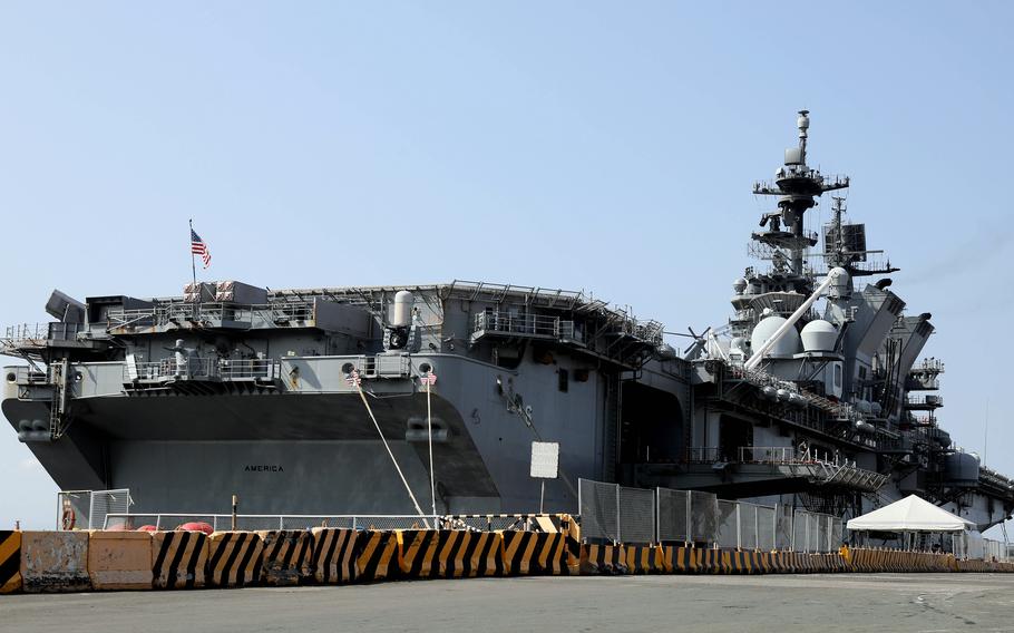 The amphibious assault ship USS America docks at Manila's South Harbor, March 21, 2023.