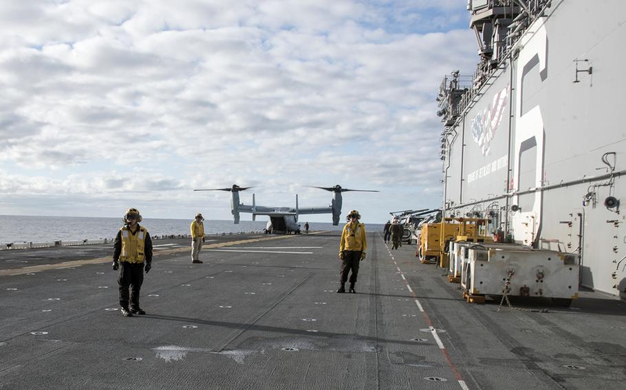 An MV-22 Osprey lands aboard the amphibious assault ship USS America during Talisman Sabre drills in the Coral Sea, Monday, July 31, 2023. 