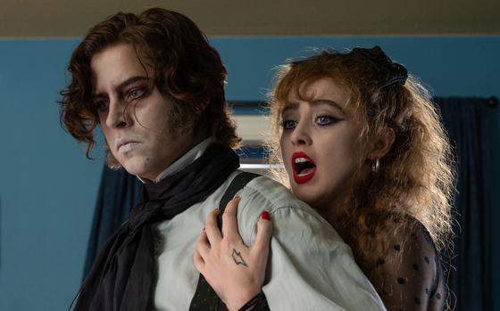 Cole Sprouse stars as the Creature and Kathryn Newton as Lisa Swallows in “Lisa Frankenstein.” 