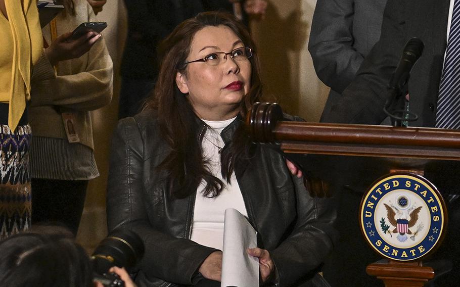 Sen. Tammy Duckworth, D-Ill., at the U.S. Capitol on March 15, 2023. A U.S. Army helicopter that she was co-piloting in the Iraq War in 2004 was brought down by enemy fire in an attack in which she lost both legs.