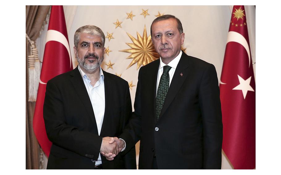 Turkey’s President Recep Tayyip Erdogan, right, shakes hands with Hamas leader Khaled Mashal at the Presidential palace in Ankara, Turkey, on Aug. 12, 2015. Since the Oct. 7, 2023, attack on Israel, top U.S. Treasury officials have made repeated visits to European and Middle Eastern capitals to coordinate efforts to halt fundraising for Hamas. Much of the diplomacy has focused on Turkey, whose government has historically supported Hamas.