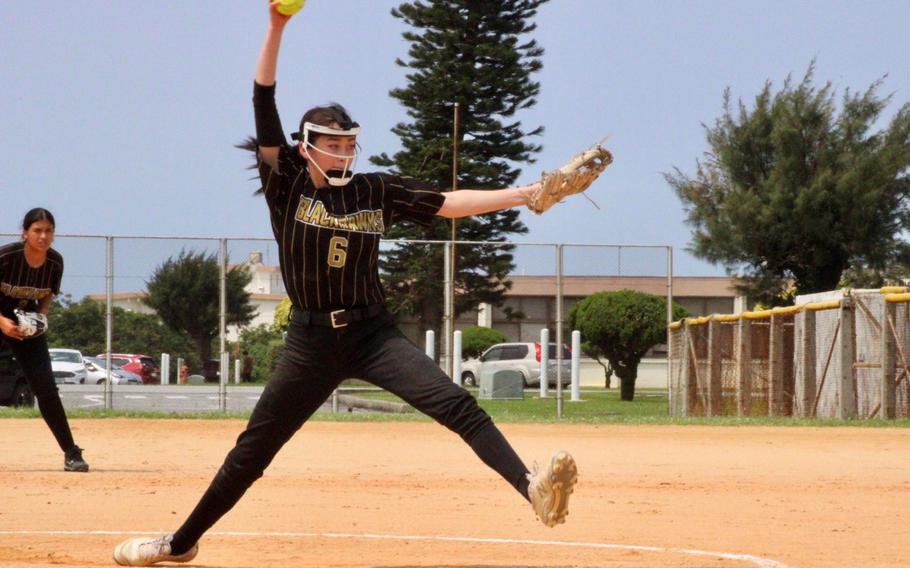 Humphreys right-hander Alexis Montalvo kicks and delivers during Monday's Far East Division I softball tournament. The Blackhawks beat Nile C. Kinnick 30-16 and lost 13-10 to American School In Japan.
