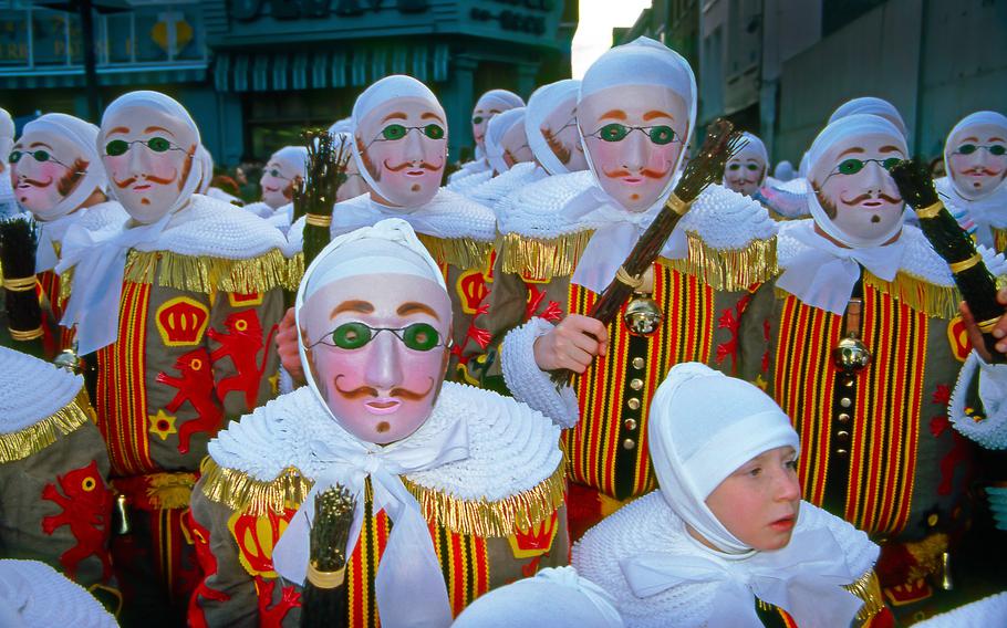 Gilles in masks dance through the streets each year in Binche, Belgium, on Shrove Tuesday. This year, that’s Feb. 13. 