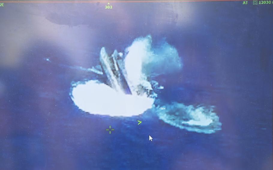 A live feed shows the target going down about 10 miles offshore during a Balikatan ship-sinking drill at the La Paz Sand Dunes in Laoag, Philippines, May 8, 2024.