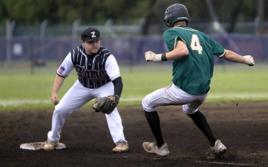 Oops! Edgren's Parker Kuns finds his path to third base blocked by Zama's Ayden Moore.
