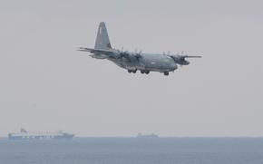A MC-130J Commando II with the 353rd Special Operations Group flies over the East China Sea from Kadena Air Base, Okinawa, Jan. 6, 2021.