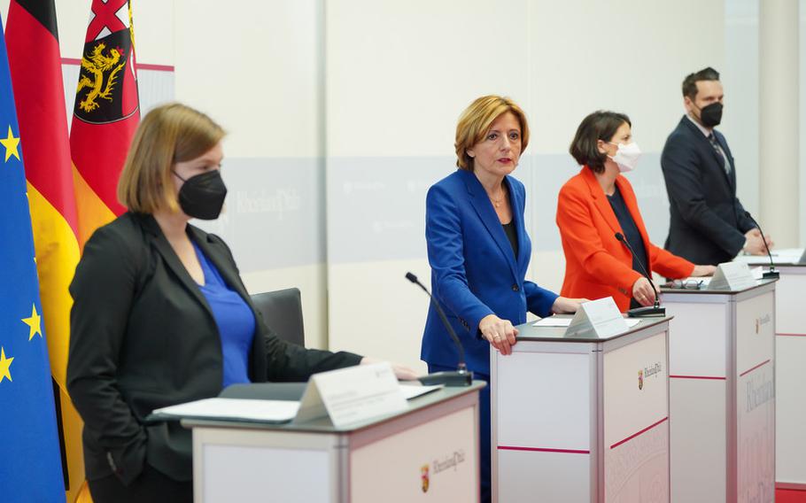 Malu Dreyer, the governor of the German state of Rheinland-Pfalz, second from left, speaks to reporters in Mainz, Germany, on Feb. 9, 2022. Dreyer’s government plans to relax certain coronavirus restrictions by Feb. 18.