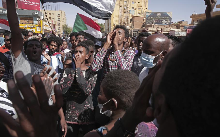 Protesters call for civilian rule and denounce the military administration, in Khartoum, Sudan, Monday, Feb. 21, 2022. Adama Dieng, the U.N.’s expert on human rights in Sudan, was in Khartoum on Monday to verify allegations of human rights violations after an October military coup plunged the country into turmoil and triggered near-daily street protests.