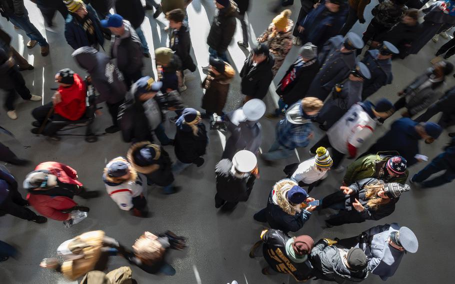 A look from above at spectators heading to their seats.