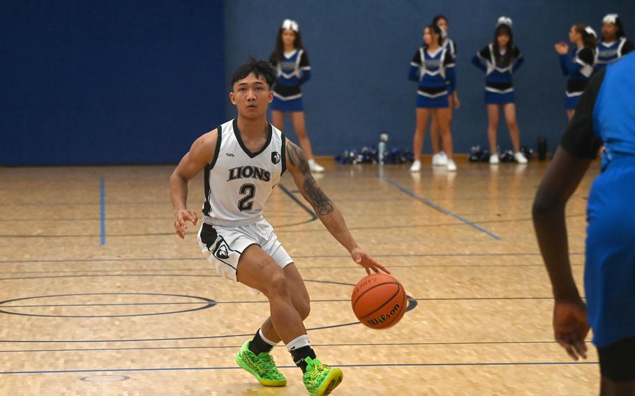 AFNORTH’s Connor Luminarias get set for a three-point shot during a game against the Tigers at Hohenfels High School on Jan. 13, 2024.