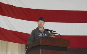 Air Force Col. Ryan Ley gives his first speech as head of the 51st Fighter Wing during a change-of-command ceremony at Osan Air Base, South Korea, June 27, 2025.