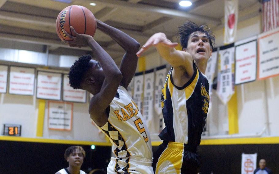 Kadena's Cedrick Dorelein shoots against International School Bangkok's Mor Nahmias during Friday's ASIJ Kanto Classic quarterfinal. Kadena won 34-31 in extra time and faces Nile C. Kinnick in Saturday's semifinal.