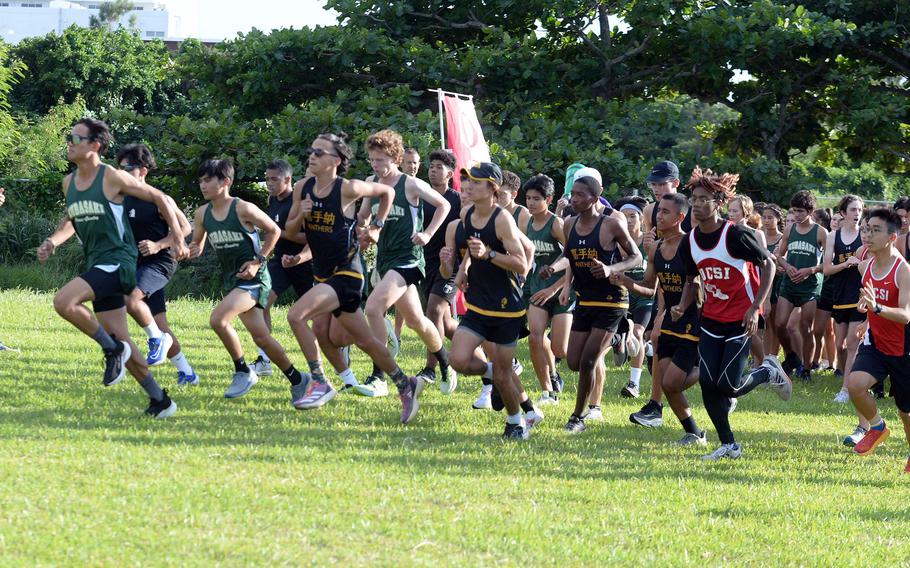 Boys runners from Kadena, Kubasakii, Okinawa Christian and Zion Christian set off during Wednesday's Okinawa cross country finals.
