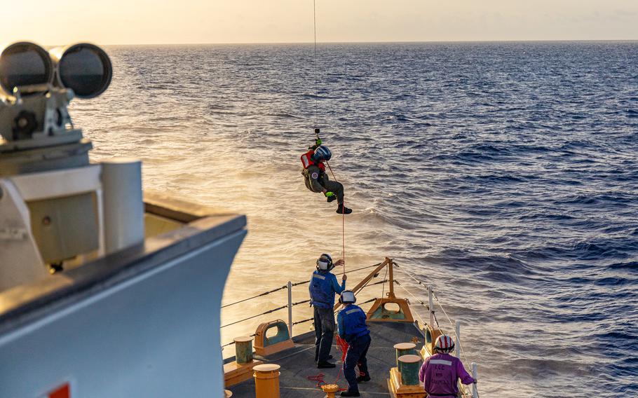 Crew members aboard the Coast Guard Cutter Campbell at sea