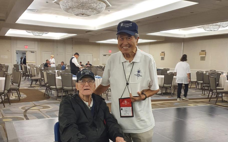 Bob Harlan, left, and John Y. Lee pose for a photo at the Hilton Crystal City at Washington Reagan National Airport in Arlington, Va., on Sept. 10, 2022. The two Korean War veterans fought in the 1950 Battle of Chosin. 
