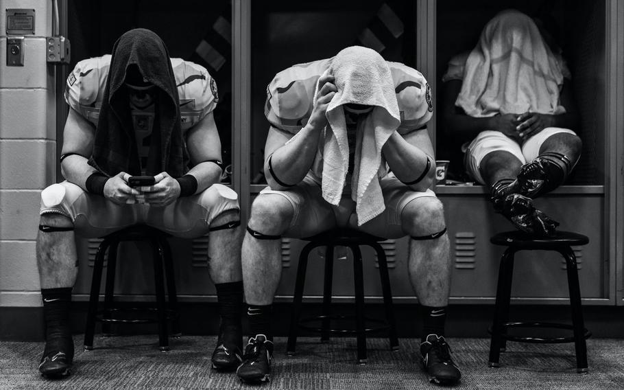 This image by Dustin Satloff of Army football players ahead of a game against Navy earned one of the top honors at this year’s World Sports Photography Awards. 