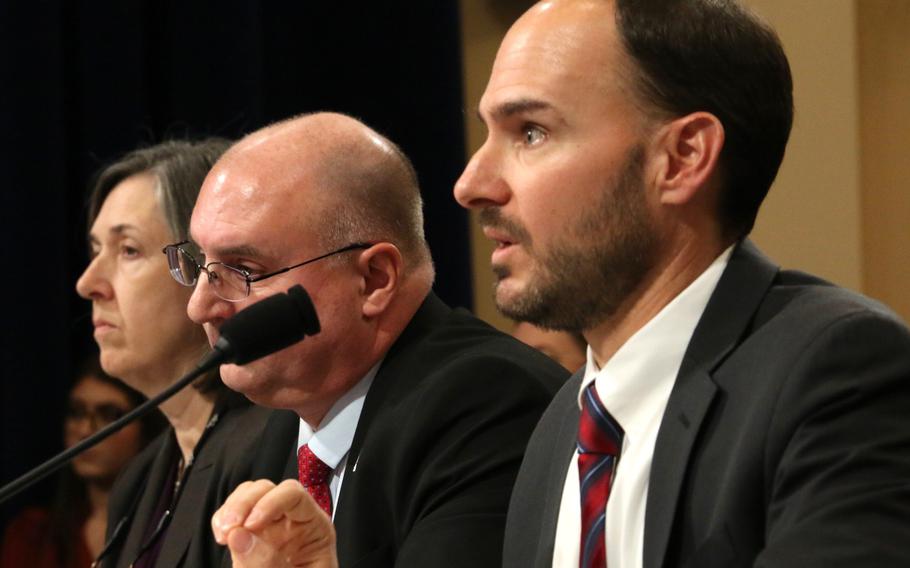 Witnesses at a House Veterans’ Affairs Committee hearing listen to opening statements Wednesday, Nov. 29, 2023, on Capitol Hill. From left to right are Elizabeth Curda of the Government Accountability Office, Kenneth Arnold of the Board of Veterans’ Appeals, and Timothy Sirhal of the VBA Office of Administrative Review.