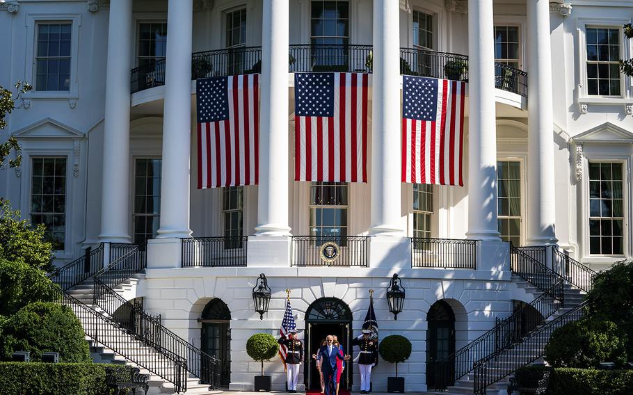 President Biden walks out to the South Lawn to sign into law the CHIPS and Science Act on Aug. 9, 2022. 