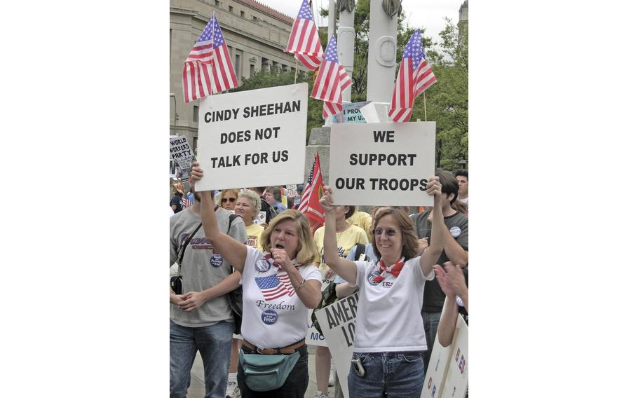 Counter-demonstrators gather at the Navy Yard in Washington, blocks from the National Mall, where anti-war protesters were assembling for their march Sept. 24, 2005. 