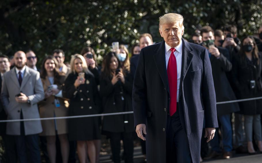 President Donald Trump exits the White House to walk toward Marine One on the South Lawn on Jan. 12, 2021 in Washington, D.C.