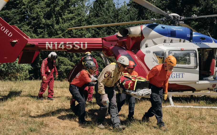 Members of Stanford Life Flight conduct a multiagency landing zone orientation in Kings Mountain, Calif., on Saturday. 