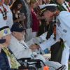 Adm. John Aquilino, commander of U.S. Indo-Pacific Command, greets Ira Schab, a 103-year-old survivor of Japan's surprise attack on Oahu, during a ceremony at Pearl Harbor National Memorial, Hawaii, Dec. 7, 2023.