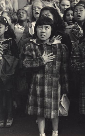 Dorothea Lange, “Children of the Weill Public School Shown in a Flag Pledge Ceremony, San Francisco, California,” April 1942, printed c. 1965, gelatin silver print. 