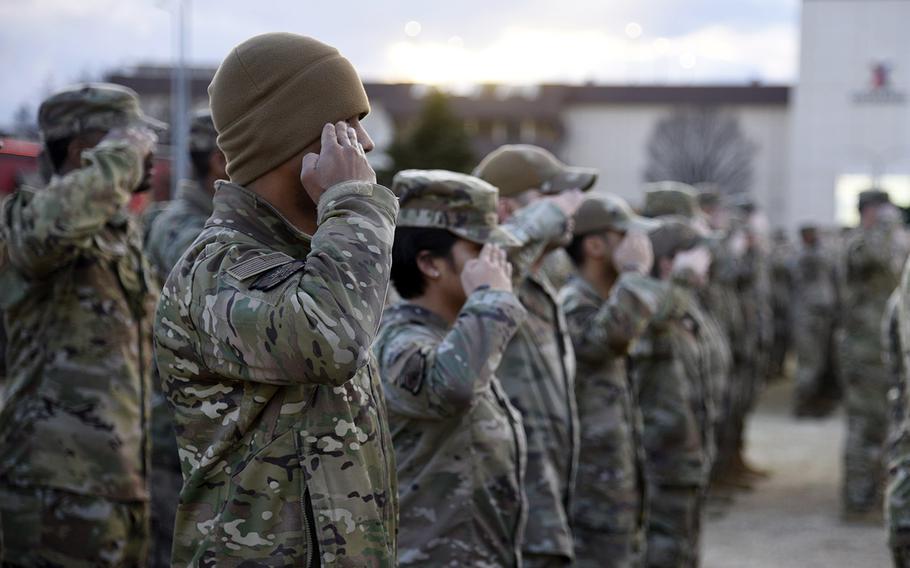 Airmen pay tribute to the fallen CV-22B Osprey aircrew during a retreat ceremony at Yokota Air Base, Japan, Feb. 15, 2024.