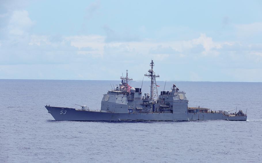 U.S. Navy Ticonderoga-class guided-missile cruiser USS Mobile Bay (CG 53) sails in formation during Rim of the Pacific (RIMPAC), July 28, 2022. 