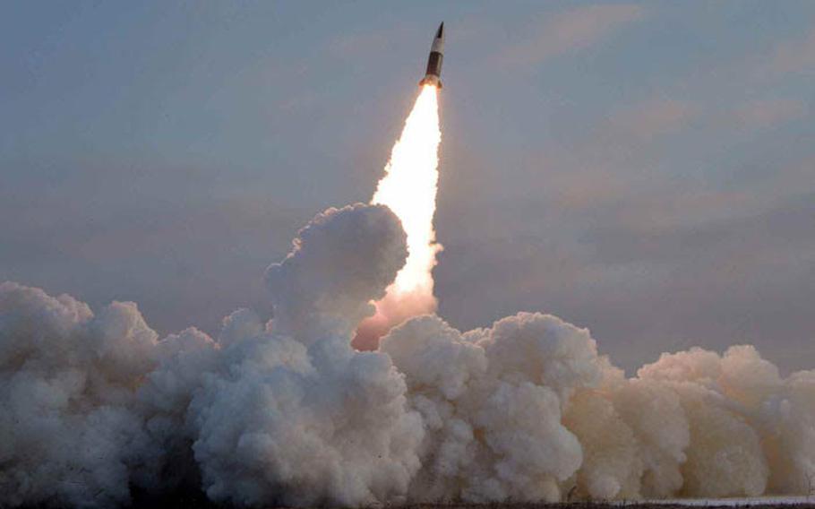 This undated image of a missile launch was released by the state-run Korean Central News Agency, Tuesday, Jan. 18, 2022. 