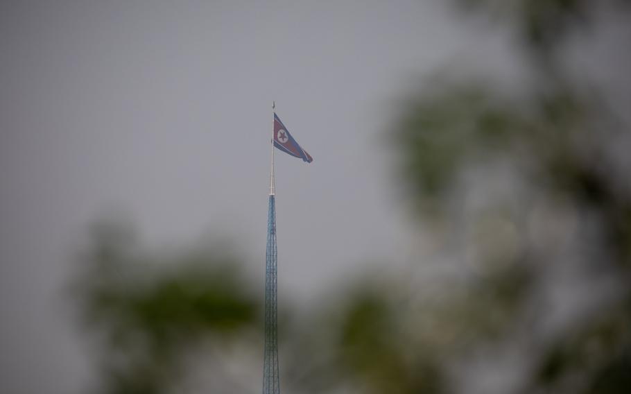 A North Korean flag flies above North Korea's Gijungdong village during a media tour of Daeseong-dong village in the Demilitarized Zone (DMZ) of Paju, South Korea, on Sept. 30, 2019. 