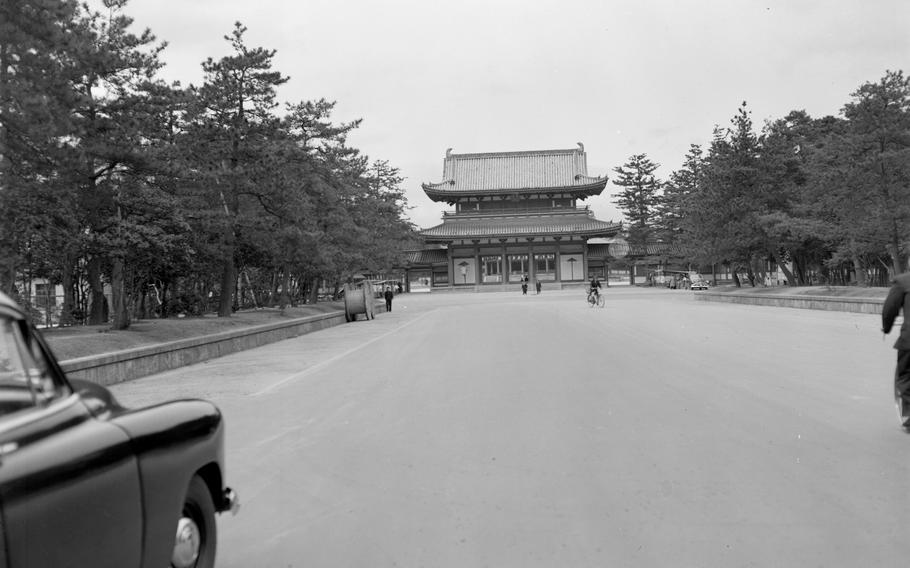 The Oten-mon Gate leading to the Heian Shrine in Kyoto, Japan, as it was in March 1955. The shrine, built in the late 19th century and dedicated to the first and last emperors who ruled from the city, was photographed by Stars and Stripes photographer Neil E. Callahan.