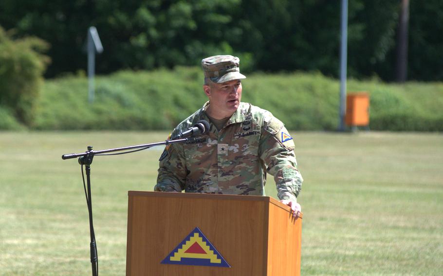 Carpenter speaks at a lectern.