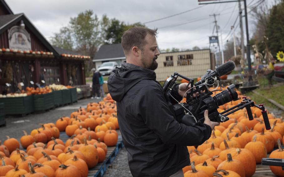 Korey Rowe shoots video for a local business ad in Oneonta, N.Y., on October 19, 2021.