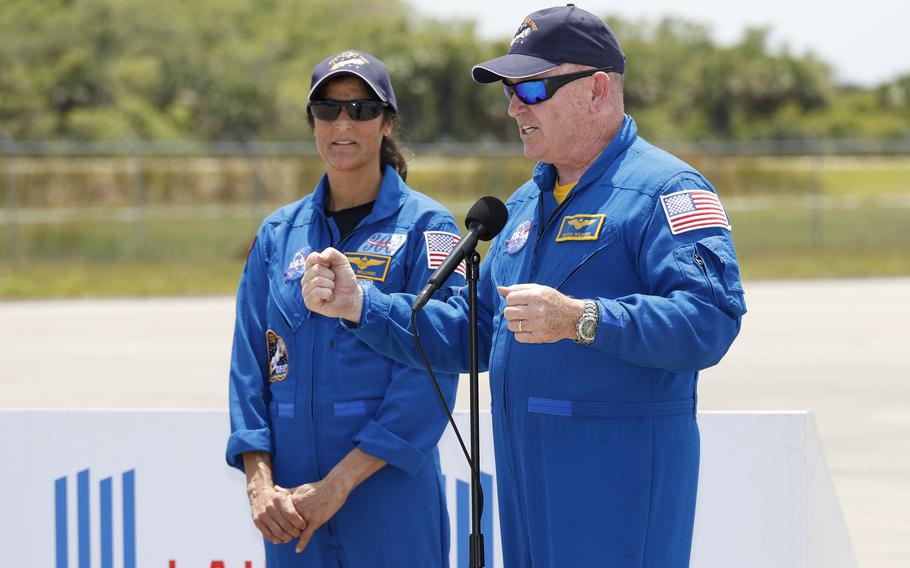 NASA astronauts Butch Wilmore, right, and Suni Williams speak to the media after they arrived at the Kennedy Space Center, Thursday, April 25, 2024, in Cape Canaveral, Fla. 