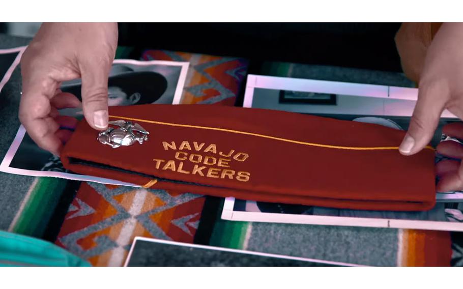 A video screen grab shows a Navajo Code Talkers paraphernalia.