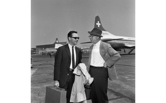 Rhein-Main airport, Germany, June 3, 1959: Actor Jack Lemmon (left) and director, writer, and producer Billy Wilder (right) chat as they wait to board a plane at Rhein-Main airport. They - together with screenwriter I.A.L Diamond are in Europe promoting their new movie “Some Like It Hot,” in which Lemmon co-stars with Marilyn Monroe and Tony Curtis.

Looking for Stars and Stripes’ historic coverage? Subscribe to Stars and Stripes’ historic newspaper archive! We have digitized our 1948-1999 European and Pacific editions, as well as several of our WWII editions and made them available online through https://starsandstripes.newspaperarchive.com/

META TAGS: Europe; Germany; entertainment; actor; celebrity; showbiz; culture; publicity tour