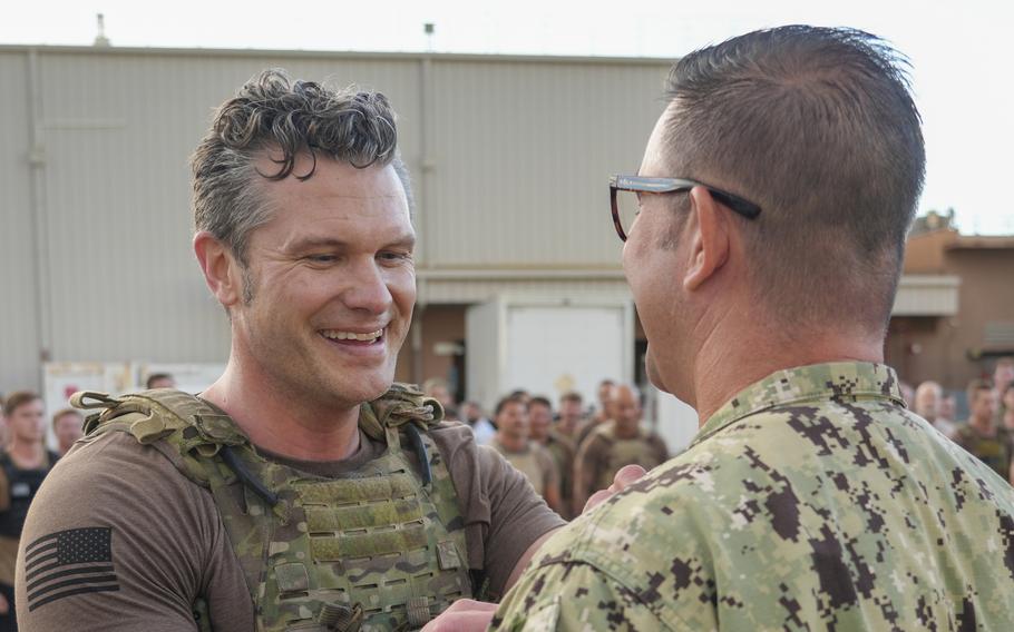 Secretary of Defense Pete Hegseth presents the Navy and Marine Corps Medal award to Chief Petty Officer Pierce Decker.