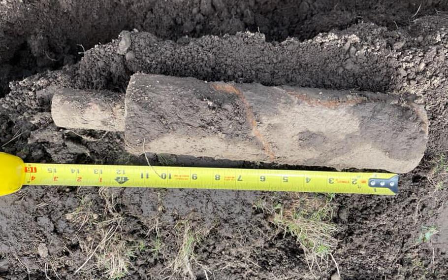 A ruler measures the size of a mortar