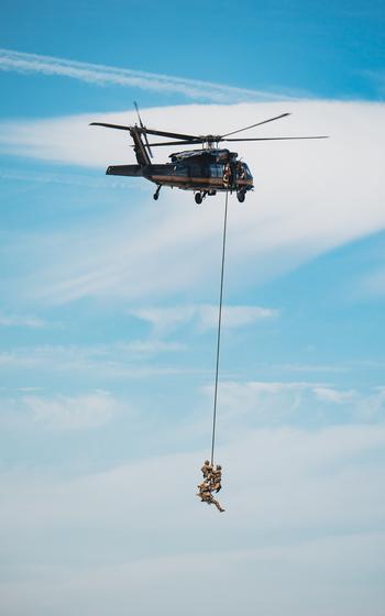 Customs and Border Protection agents perform an aerial extraction demonstration 
