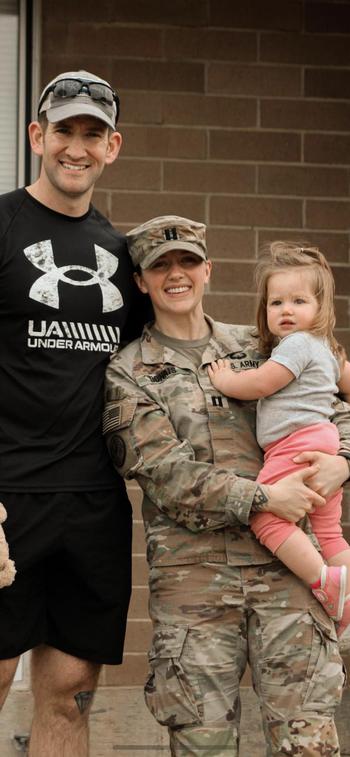 Army Capt. Pam Donais, a troop commander in 1st Brigade Combat Team, 101st Airborne Division, with her husband Staff Sgt. Dan Donais and their daughter Jordan, 1, before Pam’s deployment to Europe from Fort Campbell, Ky. 
