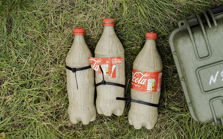 Training munitions at the Aerorozvidka session. Soldiers also make bombs out of Coke cans. 