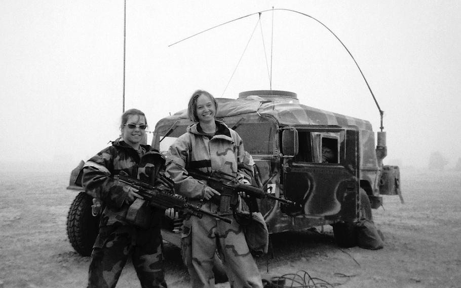 Kayla Williams, right, and another soldier during the invasion of Iraq in 2003.