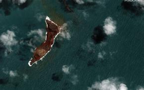 This satellite image provided by Maxar Technologies shows a view of Hunga Tonga Hunga Ha’apai volcano in Tonga Tuesday, Jan. 18, 2022 after a huge undersea volcanic eruption. 