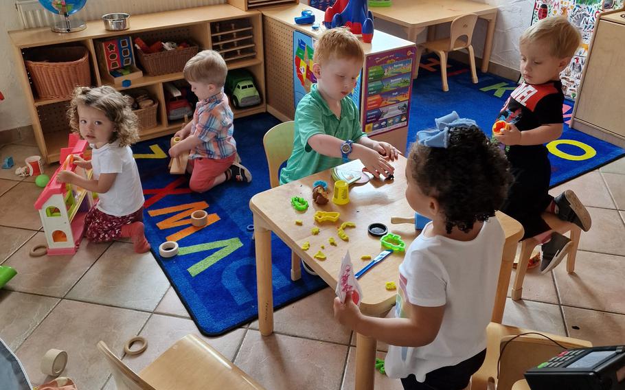 Children play in the care of Kenia Guijarro, a military spouse and Family Child Care provider, Aug. 26, 2022, in Matzenbach, Germany. Staffing shortages have made it difficult for some parents in the largest overseas U.S. military community to find day care.